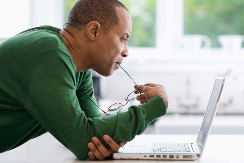 man working on laptop